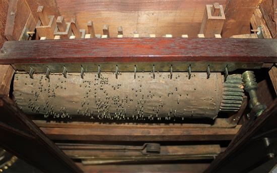 An early 19th century mahogany barrel organ, 12.5in.